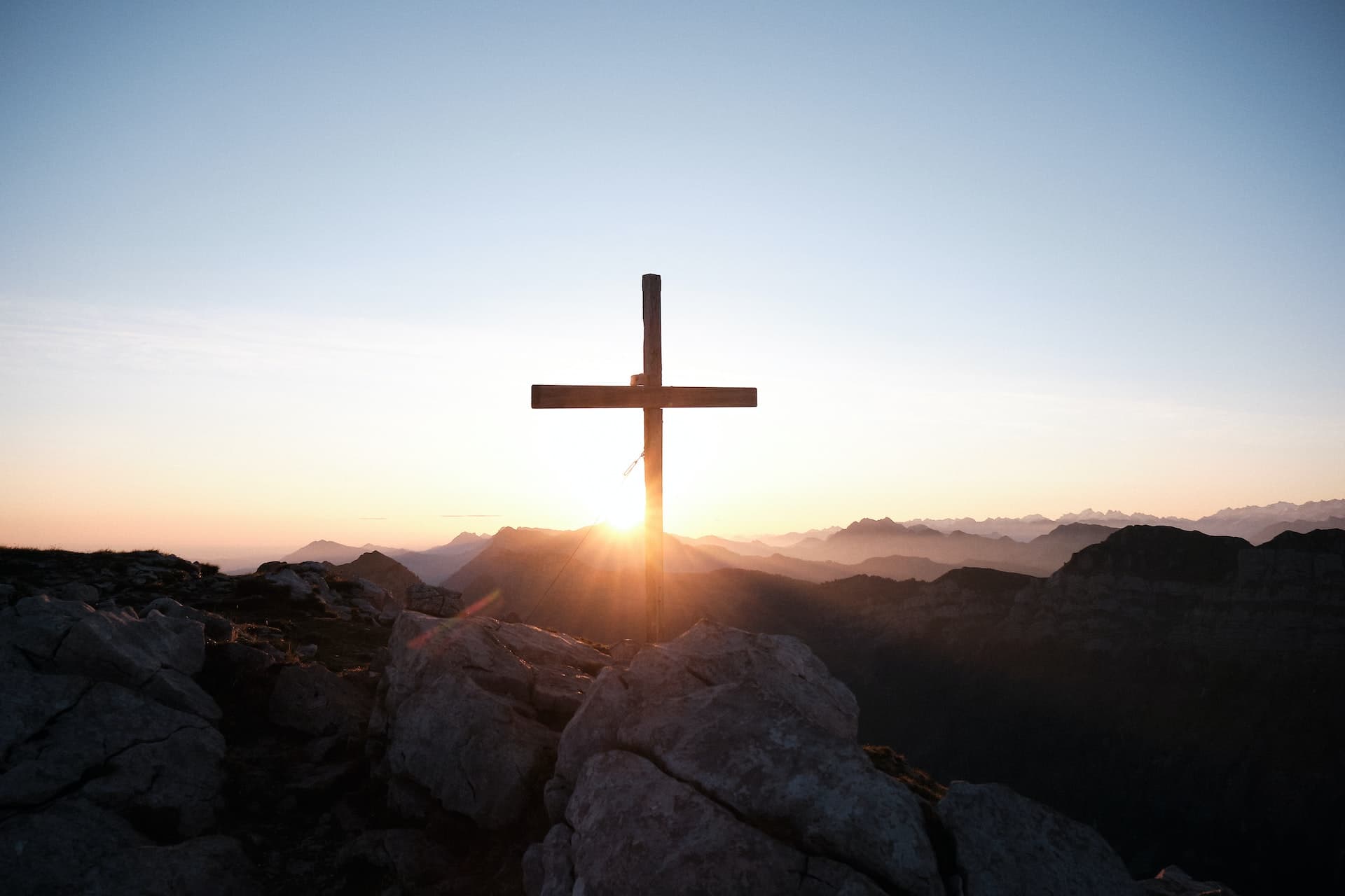 The Cross in front of mountains